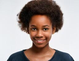 Close Up Portrait of African Teenager with Defined Defined Defined Short Natural Curls on White Background photo
