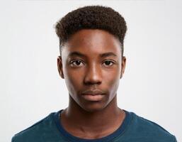 Portrait of African Teenager with Defined Defined Defined Defined High Natural Braids on White Background photo