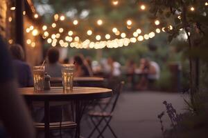 Evening patio drinks, garden party, string lights photo