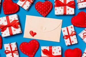 Top view of colorful valentine background made of craft envelope photo