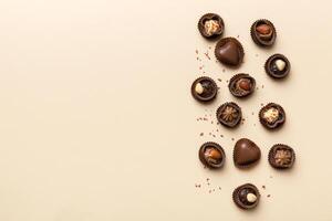 Different kinds of chocolates on table . and Flat Lay with copy space photo