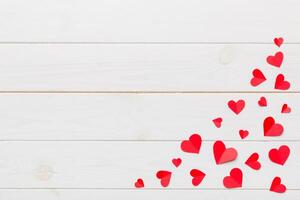 Valentine day with red hearts, top view with copy space photo