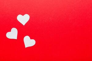 Valentine day background with red hearts top view copy space photo