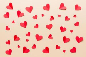 Valentine day background with red hearts, top view space photo