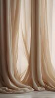 A close-up image of vertical fabric drapes with a soft flow, neutral tones, and plenty of empty space for overlaying text or graphics. photo