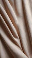 Close-up of softly flowing vertical fabric drapes, muted tones, and ample blank areas for overlaying text or graphics. photo