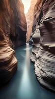 A high-resolution vertical image of a river flowing through a tight canyon, framed by rough rock walls and offering space for copy. photo