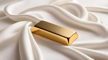 A gold ingot is elegantly arranged on a white silk background, illuminated by soft light, creating a peaceful atmosphere and room for text. photo