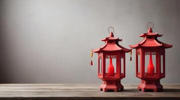 A weathered wooden table holds two or three red lanterns, and there's enough empty background space for Chinese New Year messages or branding. photo