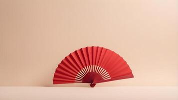 An elegant red paper fan set on a gentle cream background, featuring minimal details and room for text or branding. photo