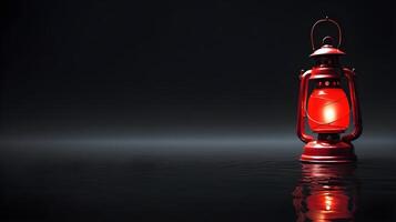 A quiet scene featuring a red lantern's reflection on a smooth, dark surface, with enough room for additional text. photo