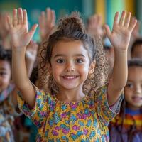 Smiling girl raising her hand in a vibrant classroom environment photo