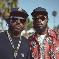 Two stylish men wearing urban fashion during sunny day near palm trees photo
