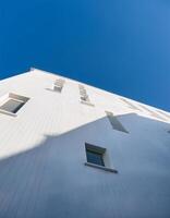Architectural Beauty Low Angle View of White Building Under Clear Sky photo