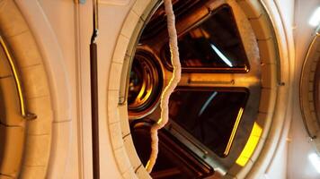 Interior view of a space station module showcasing unique round windows video