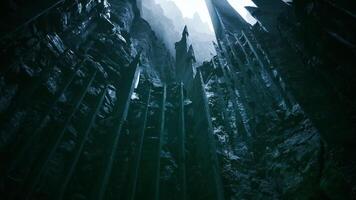 Stunning view of jagged cliffs under bright light in a mystical landscape video