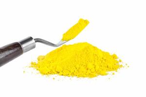 Cadmium Yellow, Colorful Yellow Powder Displayed on a White Background for Artistic or Decorative Use photo