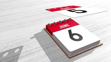 Close up of June month calendar with individual sheets flying upwards on a white wooden table with copy space. 3D Animation video
