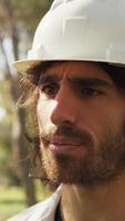 Engineer Talks To The Trunk Of A Tree To Define Construction In The Woods video