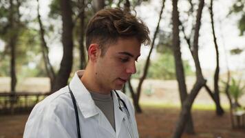 Doctor Prepares To Give Bad News About Pathology In A Park In Nature video
