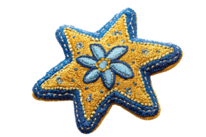 Decorative star-shaped embroidered ornament with blue and yellow patterns, featuring a floral design at its center, artistic craftwork. png