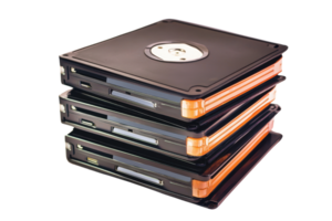 Stack of external hard drives showcasing modern digital storage solutions for data backup and file management needs. png