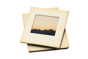 Vintage photo slides with a blurred image of a sunset in the background. Ideal for nostalgia and retro-themed projects. png