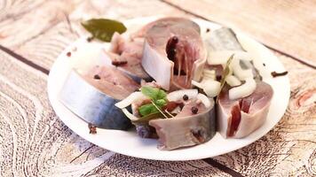 lightly salted mackerel sliced into pieces with onions and spices video