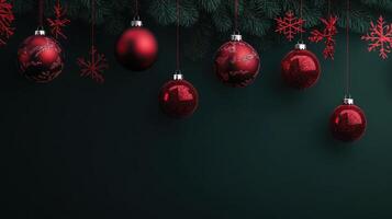 Red Christmas Ornaments Hanging from Pine Branches Against a Dark Green Background photo