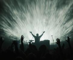 Crowd enjoys a high-energy music performance with dynamic light effects in a concert setting photo