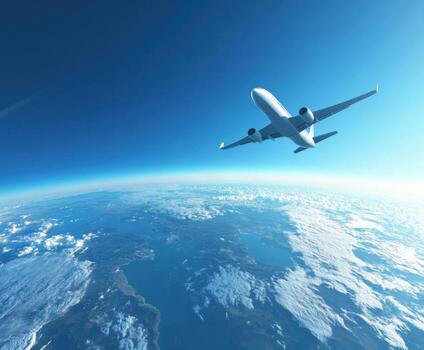 Aircraft flying high above the earth with clouds and blue sky visible in the background photo