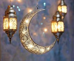 Decorative crescent moon and lanterns creating a mystical ambiance in a cozy room photo