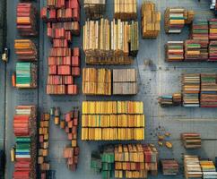Colorful stacks of shipping containers at a busy cargo terminal in daylight photo