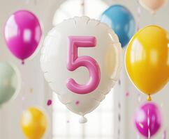 Colorful balloons celebrate a fifth birthday party in a vibrant indoor setting filled with joy and excitement photo