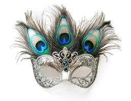 Elegant masquerade mask adorned with peacock feathers and intricate designs for festive celebrations photo