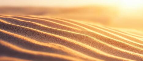 Soft golden sand textures create serene landscape under warm sunlight, showcasing gentle waves and patterns. tranquil scene evokes sense of calm and peace photo