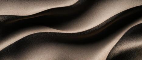 Soft, flowing fabric with gentle waves and shadows creating depth and texture. smooth surface reflects light, enhancing elegant appearance photo