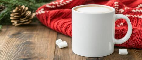 blank white mug sits on wooden table, surrounded by pinecones and cozy red knitted blanket, evoking warm, festive atmosphere perfect for winter photo