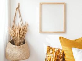 cozy bohemian bedroom featuring blank wooden frame, decorative pillows, and woven basket with dried grass. warm colors create welcoming atmosphere photo