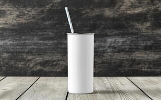 sleek white tumbler with straw on wooden surface, perfect for back to school drinks. Ideal for showcasing custom designs or branding photo