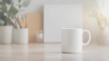 blank white mug sits on wooden table in artist studio, surrounded by art supplies and plants, creating serene and creative atmosphere photo