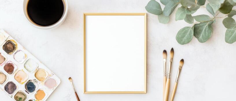 blank white frame mockup on clean white table with art supplies, including brushes and palette, creates serene workspace for creativity photo