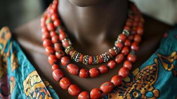 Pair of 'Nigerian' coral bead necklaces featuring traditional designs motifs worn by women in Nigeria symbolizing their connection to the land and cultural heritage photo