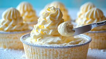 Whipped cream is expertly piped onto a dessert, creating a tempting treat full of flavor photo