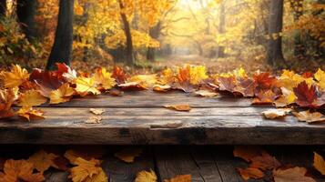 Vibrant autumn leaves cover a weathered wooden table in a peaceful forest during sunset photo