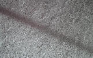 White textured varnish with light effects and shadows with a diagonal shadow. photo