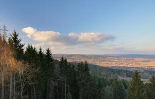 View from the Bodesruh memorial lookout tower at the former Inner-German border between Thuringia and Hesse. Wildeck, Bosserode can be seen on the right. photo