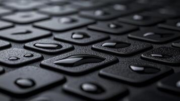 Close up of Water Droplets on a Dark Textured Surface Abstract Background photo