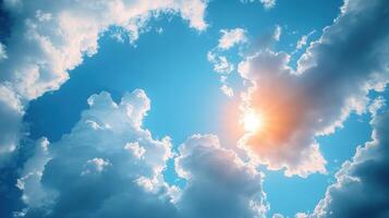 Soft clouds float in a blue sky as the sun shines brightly, creating a tranquil morning vibe photo