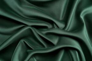 Luxurious Green Satin Fabric with Elegant Soft Folds and Smooth Texture photo